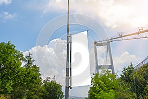 Flag blank mockup on a perfect sky with cloudy, blue and sun reflection background in istanbul street; Turkey