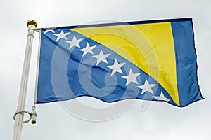 Flag of Bosnia and Herzegowina with yellow triangular and white stars