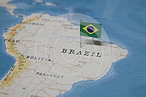 The Flag of brazil in the world map photo