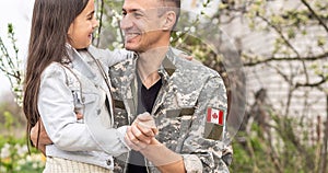 Flag of Canada on military uniform. Canadian soldiers. Army of Canada. Remembrance Day. Canada Day