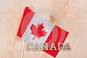 Flag of Canada, the word Canada in wooden abstract letters