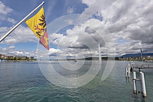 Flag of the canton of Geneva and the harbor of Geneva