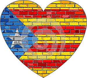 Flag of Catalonia on a brick wall in heart shape