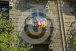 The flag of Catalonia Estelada on the balcony of the house