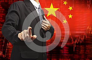 Flag of China downtrend stock data diagram with business man pushing