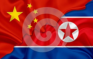 Flag of China and flag of North Korea (Democratic People's Republic of Korea)