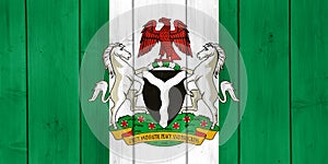 Flag and coat of arms of Federal Republic of Nigeria on a textured background. Concept collage