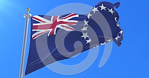 Flag of the Cook Islands waving at wind with blue sky in slow, loop