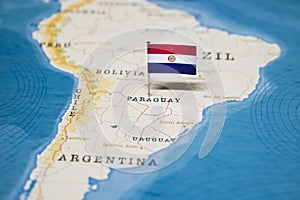 The Flag of Paraguay in the World Map photo