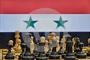 Flag of the country of Iran on the background of chess with black pieces on the Board