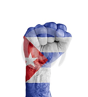 Flag of Cuba painted on human fist like victory symbol