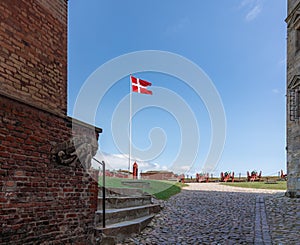 Flag of Denmark known as Dannebrog at Kronborg Castle - Helsingor, Denmark photo