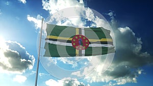 Flag of Dominica waving at wind against beautiful blue sky