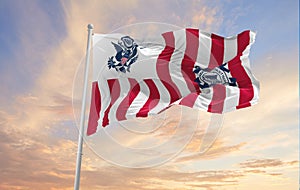 flag of Ensign of the United States Coast Guard waving in the wind. USA National defence. Copy space. 3d illustration