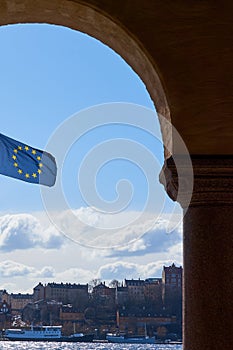 Flag of Europe against a clear blue sky.