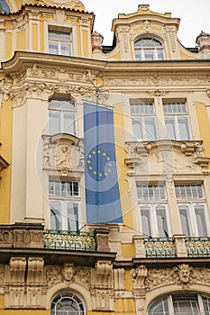 The flag of the European Union on a building in Prague in the Czech Republic. Europe. European Union. Symbol.