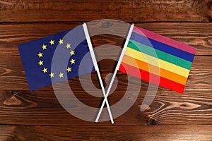 Flag of European Union and flag of LGBT crossed with each other. The image illustrates the relationship between countries