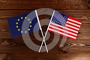 Flag of European Union and flag of USA crossed with each other. The image illustrates the relationship between countries