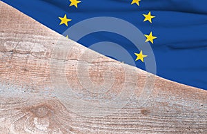 Flag European Union and space for text on a wooden background