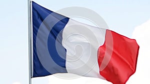 The flag of France waves in the wind in slow motion