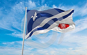 flag of French ancestry Franco-Albertans at cloudy sky backgroun