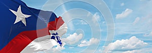 flag of French ancestry French Americans at cloudy sky background, panoramic view. flag representing extinct country,ethnic group