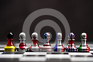 Flag of G7 countries print screen on pawn chess with black background. G7 are includes USA Germany Japan Canada France England and photo
