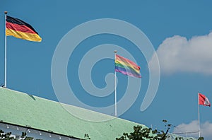 Flag of gay pride movement painted on brick wall