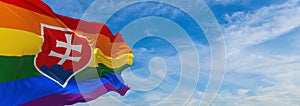 Flag of Gay, Slovakia waving in the wind at cloudy sky. Freedom