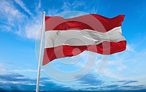 flag of German peoples Austrians at cloudy sky background, panoramic view. flag representing ethnic group or culture, regional photo