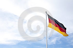 Flag germany against blue sky