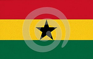 flag of Ghana. National Ghanian flag on fabric surface