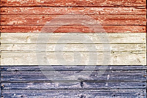 The flag of Holland with the texture of old wooden boards.