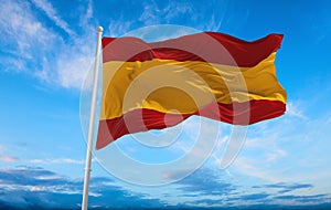 flag of Ibero-Romance peoples Spaniards at cloudy sky background, panoramic view. flag representing ethnic group or culture,