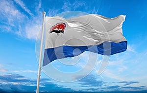 flag of Indo-Aryan ethnoreligious groups Itelmens at cloudy sky background, panoramic view. flag representing ethnic group or