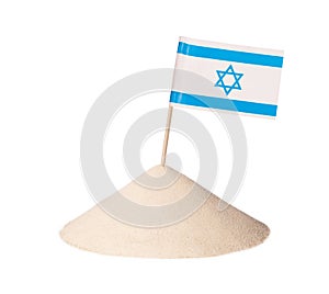 Flag Israel on a pile of white sand