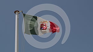 flag of the Italian maritime republics waving in the wind on sunny day