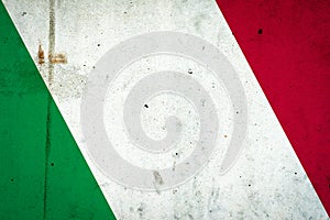 Flag of Italy on a concrete wall. Travels