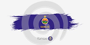 Flag of Kansas US State, grunge abstract brush stroke on gray background