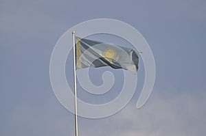 The flag of Kazakhstan develops in the wind