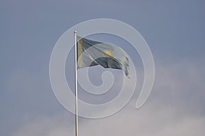 The flag of Kazakhstan develops in the wind