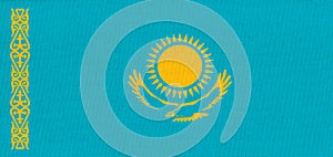 flag of Kazakhstan. National Kazakh flag on fabric surface. Asian country