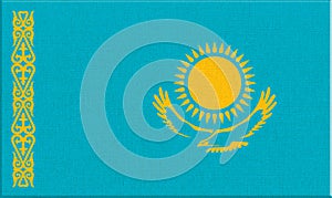 flag of Kazakhstan. National Kazakh flag on fabric surface. Asian country