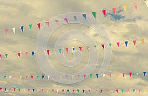 flag line with cloudy sky .