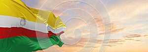 flag of Lubusz Voivodeship, wojewodztwo lubuskie , Poland at cloudy sky background on sunset, panoramic view. Polish travel and