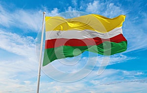 flag of Lubusz Voivodeship, wojewodztwo lubuskie , Poland at cloudy sky background on sunset, panoramic view. Polish travel and