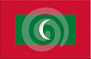 Flag of Maldives. Maldives flag on fabric surface. National symbol