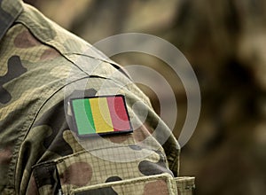 Flag of Mali on military uniform. Army, troops, soldiers. Collage