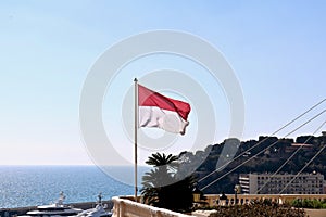 The Flag of Monaco on Display Near Port Hercule