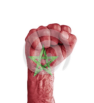 Flag of Morocco painted on human fist like victory symbol